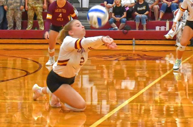 Webster Area Bearcats played against Groton Area Tigers Sept. 8 and recieved their second loss of the season. Here, Kenley Grewe makes a diving save to help the rally continue during the second set. Reporter &amp; Farmer | Connor Handrahan