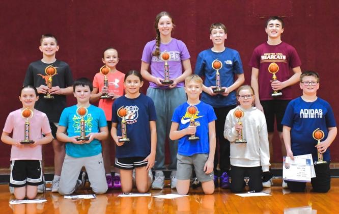 Reporter &amp;amp; Farmer | Connor Handrahan Eleven kids won first place for their age group in Knights of Columbus annual free throw contest. Winners are planning to attend the regional competition at Roncalli Elementary School Feb. 1. From back left, Landen Lee, Lindsey Butler, Carlee Wik, Kellin Boik, Tak Lesnar, from front left, Libby Hugget, Logan Wik, Keisha Rencountre, Tryan Gaikowski, Larissa Butler and Kellin Boik.