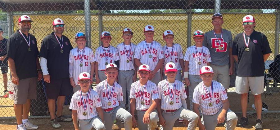 Roslyn Diamond Dawgs baseball team pose for a picture after winning the 11U NIT End of Season tournament at Tharaldson Little League Complex in Fargo, ND July 27. Back, from left, are Tyler Lee, Jerry Lesnar, Decker Huggett, Cooper Gangle, Easton Ermer, Kane Baumgarn, Kru Johnson, Braxton Breske, Mark Ermer and Spencer Huggett. Front, from left, are Tucker Aadland, Jaxson Hansen, Landen Lee, Cooper Lesnar and Landry Lesnar. Reporter &amp;amp; Farmer | subscriber snapshot