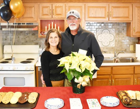 Pleasant View Apartments hosted a celebration event in recognition of their 50 years in operation Dec. 13. Offered at the event were cider, coffee and baked goods. Here, from left Julie Berger and Arnie Berger stand with the desserts given out to attendees at the complex’s community center. Reporter &amp;amp; Farmer | Brenner Cariveau