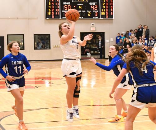 Peyton Rumpza (1) of Waubay/Summit puts up a shot during the Mustang’s 52-47 victory over Florence/Henry Falcons Dec. 15 in Summit. With the victory Waubay/ Summit moved to a record of 2-0 to start the season. Reporter &amp;amp; Farmer | Robert Dulitz