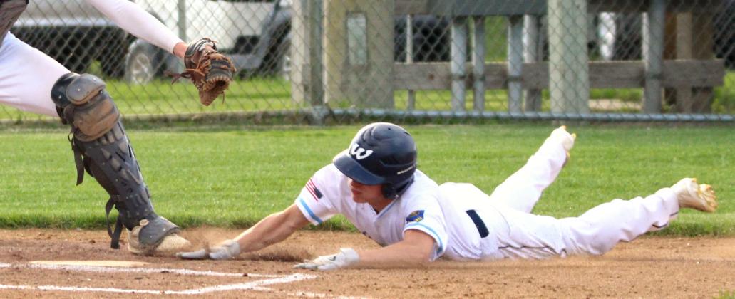 Martin Dorsett of Webster Legion Post 40 slides home to score the winning run in the bottom of the fifth inning of Webster’s 2-1 win over Sisseton June 30. Dorsett led off the inning with a single and was batted in by Blaize Amdahl. Reporter &amp;amp; Farmer | subscriber snapshot