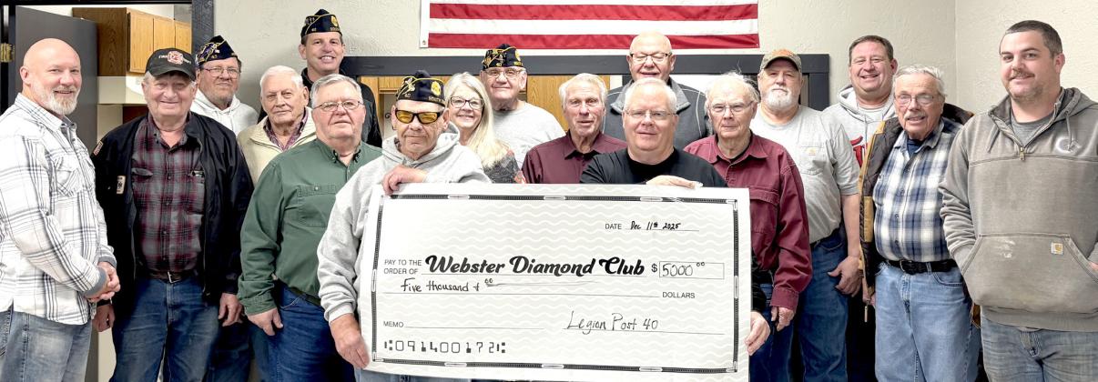 Webster American Legion donated funds to Webster Diamond Club. Pictured from left, holding the check are Randy Gaikowski and Mike Wiley; second row, Jeff Nelson, Paul Peterson, Paul Tvinnereim, Kris Tvinnereim, Dennis Kurkowski, Wayne Klungseth, Chuck Johnson, Zach Witte; back, Dennis DeWitte, Allan Weismantel, Tom Sannes, Tom Lewno, Rich Lesnar, Bob Page and Chad Hesla. Reporter &amp;amp; Farmer | Subscriber snapshot