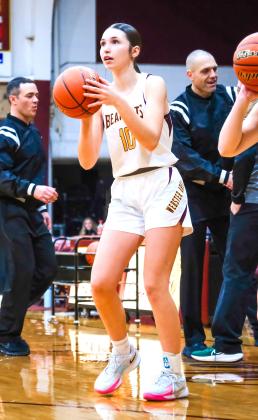 Webster Area sophomore Georgia Vergeldt set a girls school record by hitting six three-pointers during the team’s 62-39 victory over Britton-Hecla Braves Jan. 19 in Britton. Vergeldt (10) pictured Dec. 29 warms up before a Bearcat girls varsity basketball game at Webster Armory. Her statistics from the record setting game include going six of six from three and two of two on two-pointers for a combined 22 points. Reporter &amp;amp; Farmer | file photo, Leyton Beardslee