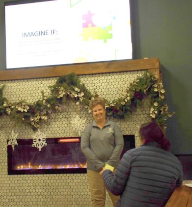 South Dakota State University held a childcare roundtable at Roots Kitchen &amp;amp; Taphouse Nov. 12 to discuss the issues surrounding childcare infrastructure in rural communities. Here, Audrey Rider, who is an early childhood field specialist, listens to a community member share their solutions for the childcare issue in Webster. Reporter &amp;amp; Farmer | Brenner Cariveau