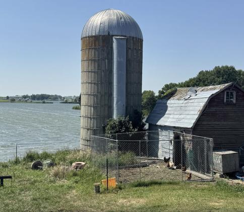 The silo is all that remains of the old hip roof barn where the Rumpca family milked cows before the water came. Reporter &amp;amp; Farmer | subscriber snapshot
