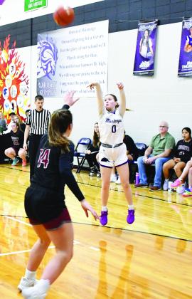 Waubay-Summit girls basketball hosted the Aberdeen Christian Knights Jan. 23 which resulted in a 42-18 Mustangs victory. Here, Brianna Lindholm (0) attempts a three pointer while Aberdeen Christian defender Sophia Eichler (14) closes out on her shot. Reporter &amp;amp; Farmer | Brenner Cariveau