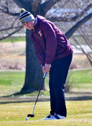 Michael Dorsett watches his putt during the Webster Area Invitational Tournament April 22. Reporter &amp;amp; Farmer | Leyton Beardslee