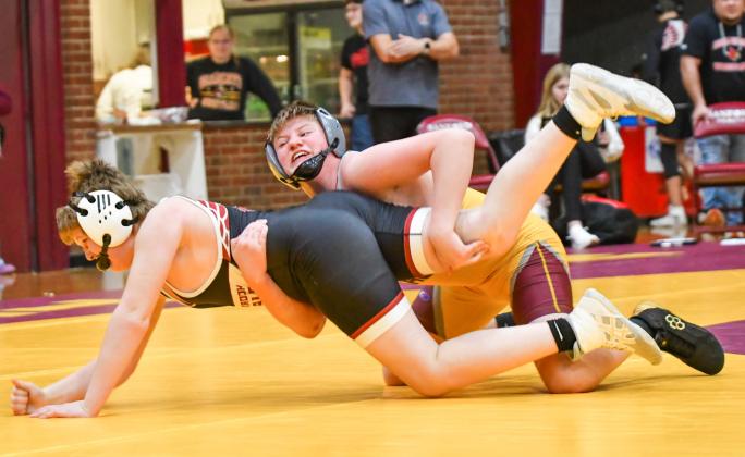 Kane Baumgarn of Webster Area takes down his opponent during a dual meet with Clark/Willow Lake, Kingsbury County and Deuel/Deubrook Area at Webster Armory Jan. 13. Webster Area finished with a 0-3 record for the meet. Reporter &amp;amp; Farmer | Leyton Beardslee