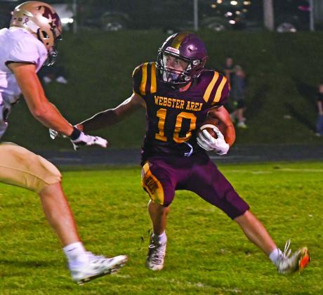 Henry Witt (10) runs the ball during Webster Area’s 8-22 loss against Milbank Oct. 3 in Webster. Bearcats leading rusher for the game was Matthew Mount with four carries for 25 yards and a touchdown. Reporter &amp;amp; Farmer | Amanda Dulitz