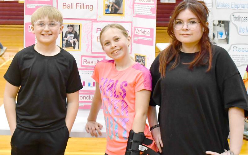 After the Webster Area Elementary wax museum the fifth grade class showcased their science fair projects. Here, Fred Bloom, Areia Lesnar and Italia Dorian did the research to find out what is in a stress ball. Each team did a different item to research. Reporter &amp;amp; Farmer | Jess Washenberger