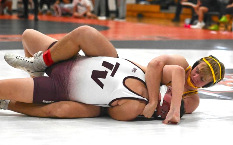 Gage Baumgarn of Webster Area gets his opponent in a hold during the Ken Ruml Tournament in Howard Dec. 13. Baumgarn finished fourth in the 165 weight class with a record of 3-2. Reporter &amp;amp; Farmer | Brianna Jorgenson, Captured Creations Photography