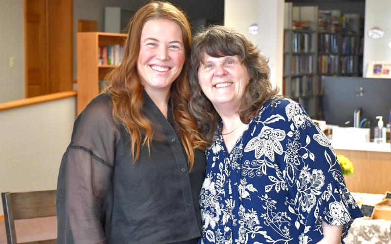 Ashley Bosh held an author meet and greet at Webster Public LIbrary April 8. Bosh is a North Dakota native, but has several family ties to Day County. This is Bosh’s first published book and it’s loosely based on her own life as a struggling single mother. From left, Bosh meets with head librarian Patricia Proctor and community members to socialize and sign books. Reporter &amp;amp; Farmer | Connor Handrahan
