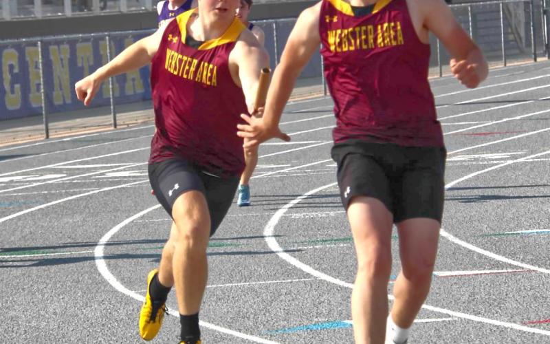 Isaac Nelson hands the baton off to Jeron McCreary during the 4x200 relay at the Al Sahli Invite in Aberdeen May 9. The boy’s team placed eighth with a time of 1:39.36. Reporter &amp;amp; Farmer | Subscriber snapshot