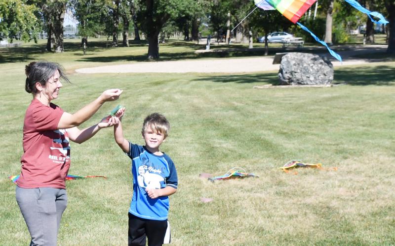 As the annual Fort Sisseton Harvest Festival took place Sept. 21, kite flying was one of the activities offered for attendees to partake in. Pictured on the right are six year-old Britton resident Rowan Armour with his mother Tara Arntsen flying one of the many available kites during the windy day. Reporter &amp;amp; Farmer | Brenner Cariveau