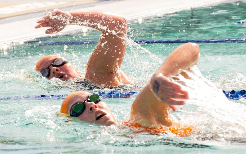From left Karley Lone and Samantha Ermer of the Webster Swim team compete in the 200 meter individual medley during the Webster High Point meet at the Webster Aquatic Center June 27. Lone placed fifth in the female 11-12 year old category with a time of 3:13.16 and Ermer placed first in the female 13-14 year old category with a time of 3:12.84. Reporter &amp;amp; Farmer | Leyton Beardslee