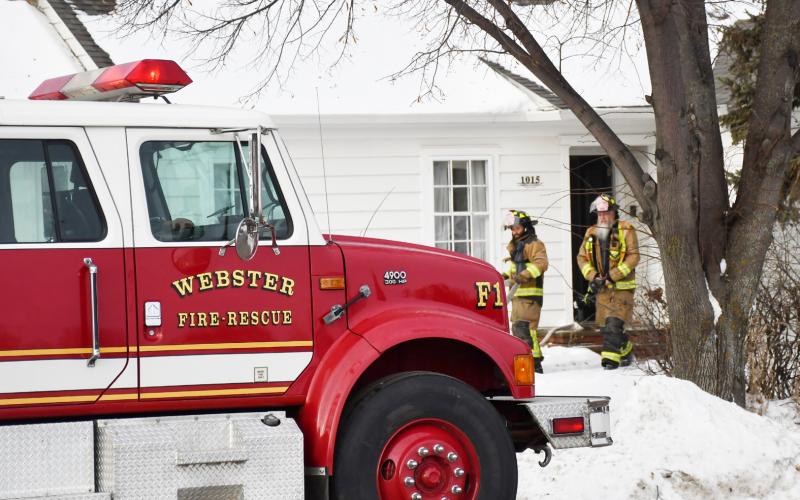 Webster Fire Department responded to a small house fire at 1015 Main St. Dec. 6. The fire was caused by an electrical heater in the home. No injuries or serious damage resulted. Here, firefighters Allan Jaspers and Wes Hoven walk out of the home after evaluating the scene. Reporter &amp;amp; Farmer | Brenner Cariveau