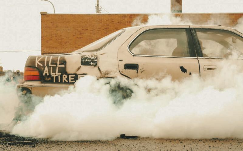 Mason Bock in his Lexus LS400 competes in a burnout contest at Pumpkin Fest in Webster Oct. 4. Bock, who is from Watertown, placed first in the competition. Reporter &amp;amp; Farmer | Leyton Beardslee