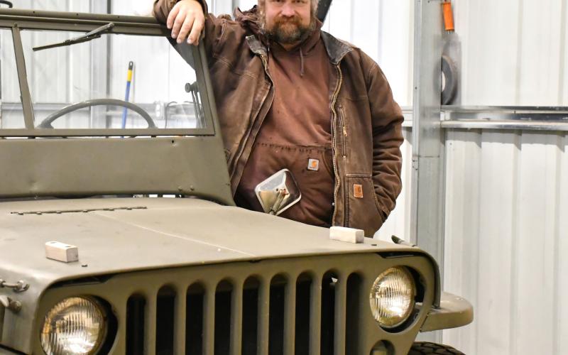 Scott Soto of Roslyn stands with his 1942 jeep Dec. 6 which was previously owned by his grandfather. Soto and his family are originally from California but moved to Roslyn in 2022. Reporter &amp;amp; Farmer | Leyton Beardslee