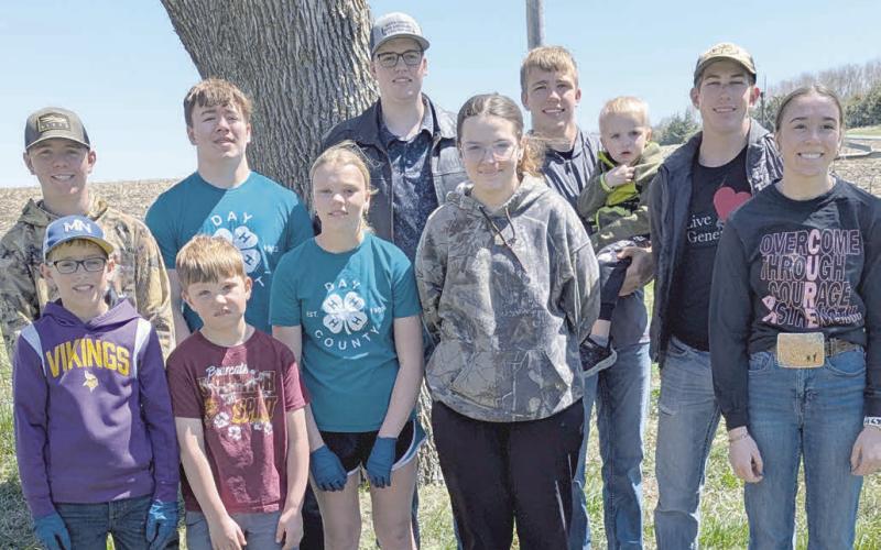 Country Kids 4-H Club completed their yearly community service project at New Sweden Cemetery. They picked up branches before mowing and planting flowers in pots. Pictured from left, front, are Nolan Rasmus, Will Weitbrecht, Morgan Weitbrecht, Lynnea Hubsch, Gabriel Gaikowski, Macee McGregor; back, Dylan Rasmus, Nathan Hubsch, Blaise McGregor and Aiden Gaikowski holding Maverick Thurston. Reporter &amp;amp; Farmer | Subscriber snapshot
