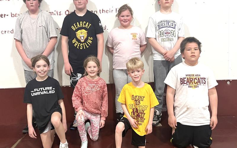 Bearcat AAU wrestlers competed in the Region 4 wrestling tournament in Brookings March 15 with a spot to compete at the state level up for grabs. Eight of the 17 Bearcats who competed in the tournament advanced to the state tournament in Rapid City March 29-30. Pictured from back left, Bryson Johnson, Kane Baumgarn, Emerie Schlechter, Karstyn Schlechter. From front left, Finley Marko, Adeline Johnson, Camdyn Huffman, Hunter Fellbaum.