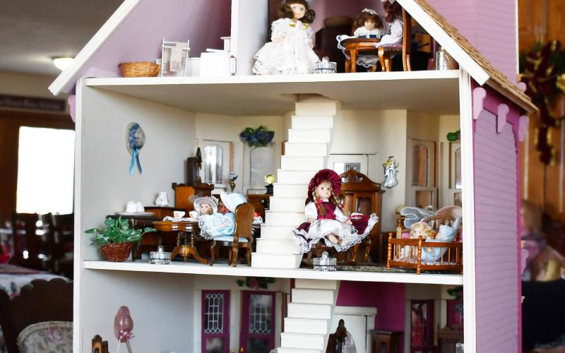 A major focal point of Anna May Carlis’ doll collection includes a hand crafted doll house which her late husband Glenn created for her. Inside the house includes porcelain dolls and mini furniture across three levels. Reporter &amp;amp; Farmer | Brenner Cariveau