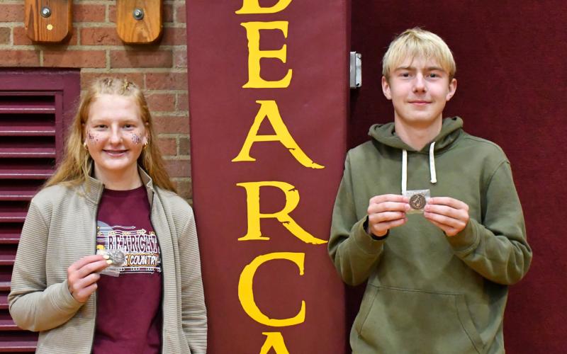 Webster Area varsity cross country runners, from left, Hannah Sonstebo and Grady Wagner qualified for the SDHSAA Class A meet held in Huron Oct. 25. Sonstebo finished 13th in the girls 5k at SDHSAA Region 1A meet Oct. 15 and Wagner placed 19th in the boys 5k. Reporter &amp;amp; Farmer | Leyton Beardslee
