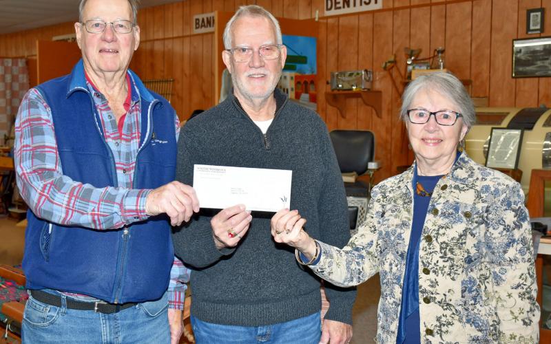 Holding up a check for $60,000 donated to the Museum of Wildlife, Science &amp;amp; Industry in Webster by Harry and Denise Knapp, are from left H. Knapp, museum board president Monte Rougemont, and D. Knapp. Donations now total $140,000 which the museum has received to construct a new building to house the contents being relocated from the Day County Courthouse Museum. Reporter &amp;amp; Farmer | Leyton Beardslee