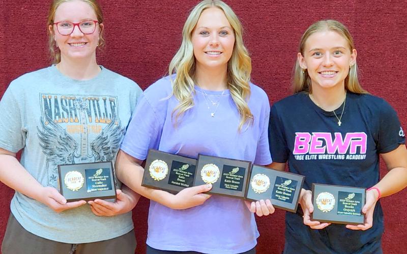 Webster Area girls track and field athletes hold up their end of season awards. From left Callie Shoemaker was awarded most improved, Katie Braun was awarded hardest worker, most valuable field events and the Ashley Charron award for most valuable overall, Brooke Grajczyk was awarded most valuable runner. Reporter &amp;amp; Farmer | subscriber snapshot