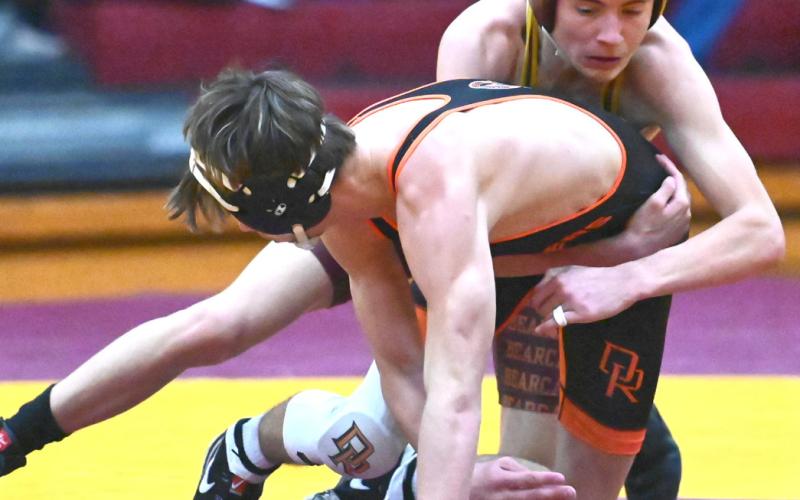 Tayten Kurkowski of Webster Area gets a grip on Camden Tebay of Dell Rapids Quarriers during their match at North/South Double Dual Feb. 5 in Webster. Kurkowski lost the match 1-4 by decision. Reporter &amp;amp; Farmer | Brianna Jorgenson, Captured Creations Photography