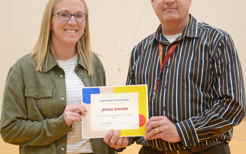 Jenna Sinner was announced last week as the Region 1 Teacher of the Year during an assembly at Webster Area High School April 23. Sinner was presented a certificate by Webster Area Superintendent Jim Block who explained he had just received notification that morning of Sinner’s award from the state. Reporter &amp;amp; Farmer | Amanda Dulitz