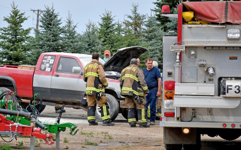 Webster firemen responded to report of a vehicle fire July 31 in Webster near the north entrance of the Northside Implement parking lot. By the time they arrived, however, employees from the nearby business had extinguished the flames in the engine compartment of the vehicle. Reporter &amp;amp; Farmer | Amanda Dulitz