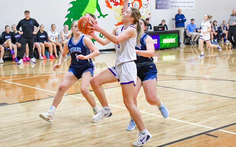 Liza Purdy (5) of Waubay/Summit goes up for a layup during the Mustang’s 58-27 win over Leola/Frederick Titans Feb. 24 in Waubay. Purdy finished the game with two points, three rebounds and five assists. Reporter &amp;amp; Farmer | Connor Handrahan