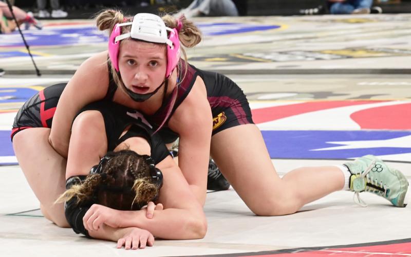 Bearcat girls wrestlers competed in the state wrestling tournament Feb. 27- March 1 in Rapid City. Here, Brooke Grajczyk mantles her opponent during the match. Grajczyk finished sixth overall in the girls 145 weight class. Reporter &amp;amp; Farmer | Dax Jorgenson