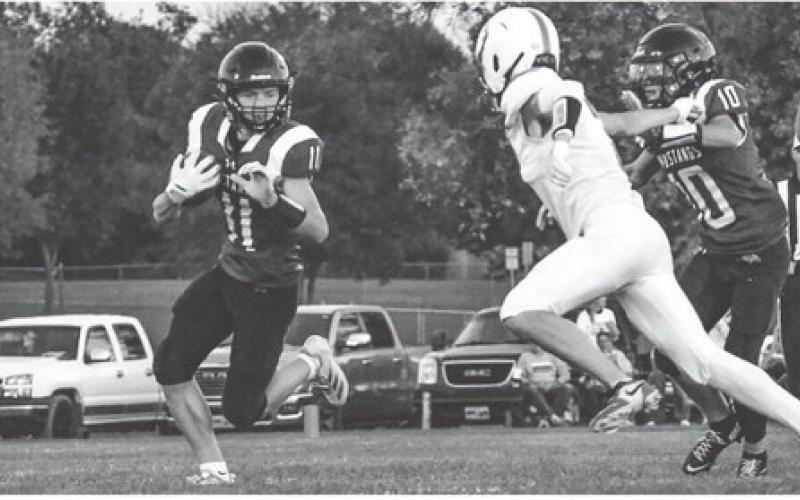 Krew Gaikowski (11) returns a kickoff for Waubay/Summit during their 0-53 loss against Britton-Hecia in Waubay Oct. 3. No statistics were reported for the game but the Mustangs move to a record of 1-6 on the season. Reporter &amp;amp; Farmer | Leyton Beardslee