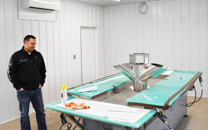 Webster fish cleaning facility is nearing the end of it’s development. Here, Webster Area Chamber of Commerce member Eric Hanson explains how the new fish grinder works Oct. 31. Hanson said the facility will be ready for operation after the ADA accessible slabs of concrete are implemented on the exterior of the building along with a few minor details on the inside. The new facility is the result of a lot of hard work from the chamber of commerce over the past year. Reporter &amp;amp; Farmer | Brenner Cariveau