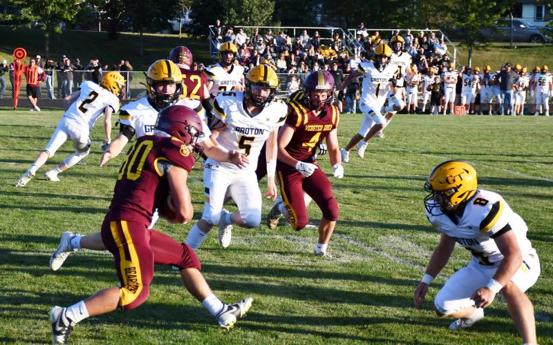 Webster Area running back Tate Mammenga braces for contact with a Groton Area Tiger during the homecoming contest Sept. 6, which resulted in a 7-14 loss for the Bearcats. Reporter &amp;amp; Farmer | Brenner Cariveau