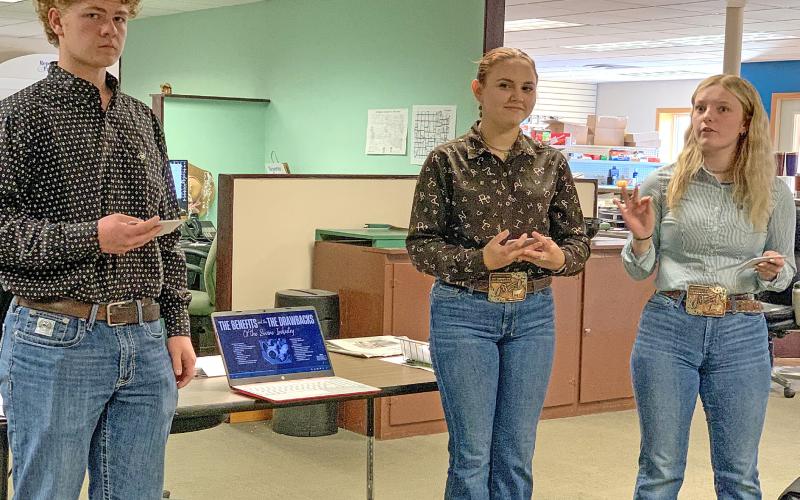 Needing a group of people to practice their FFA presentation, Webster Area High School students Delaney Atherton, Lola Wells and MacKenzie Atherton stopped by the Reporter &amp;amp; Farmer office Nov. 5. They presented in a debate format about raising various kinds of livestock in free range versus animal confinement operations. The group will go on to present at the region competition. Reporter &amp;amp; Farmer | Amanda Dulitz
