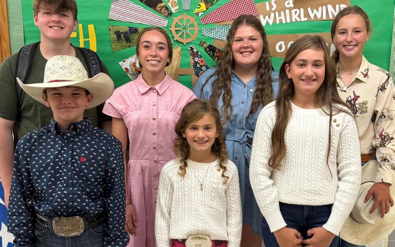 Day County 4-H Fashion Revue award recipients pose for a picture in the Day County Courthouse July 31. Back, from left, is Carson Fischer, senior reserve champion, Macee McGregor, senior grand champion, purple ribbon, Kelsey Fischer, senior purple ribbon and Carlee Wik, junior reserve champion. Front, from left, is Logan Wik, beginner purple ribbon, Ava Larson, beginner reserve champion, purple ribbon and Cora Larson, junior purple ribbon and purple ribbon. Reporter &amp;amp; Farmer | subscriber snapshot