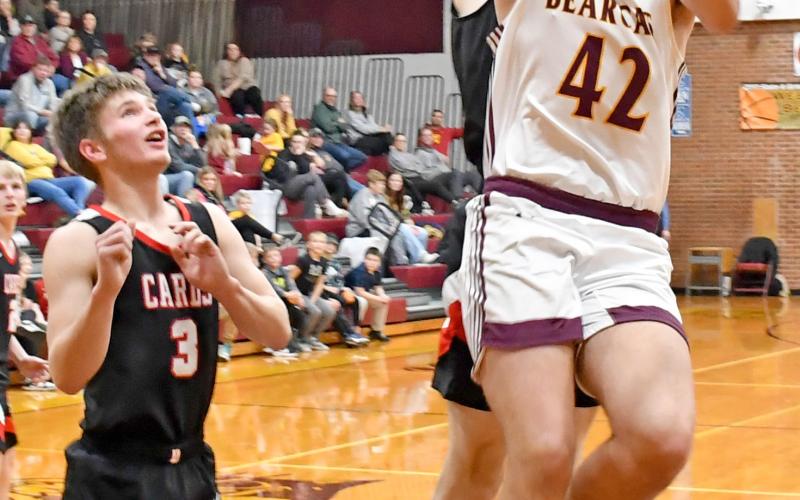 Webster Area Bearcat Jack Shoemaker goes up for a basket in a home game Jan. 9 against the Deuel Cardinals. The Cats fell 64-38. Reporter &amp;amp; Farmer | Robert Dulitz