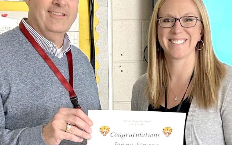 Webster Area School Superintendent Jim Block presented a certificate to teacher of the year, Jenna Sinner, high school science teacher. Sinner has been with the school district for 15 years. Reporter &amp;amp; Farmer | Subscriber snapshot