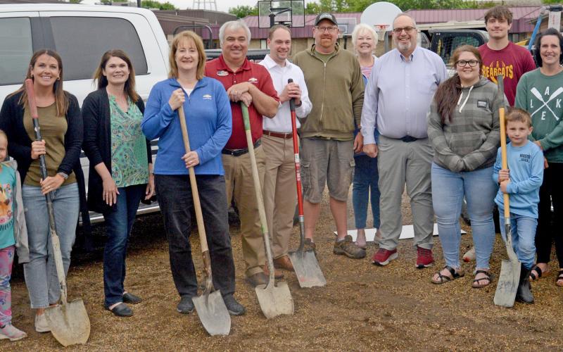 Donors, teachers and volunteers gathered for the groundbreaking for the new playground equipment at the Webster Area School playground June 18. Pictured from left are Emily Wagner, Lucy and Natalie Kuecker, Allegra Duerre, Lisa and Loren Schoenbeck, Kelly Hanson, Mike Ninke, Rita Johnson, Todd Garry, Teresa Lone, Jack, Alyssa and Huck Shoemaker and Craig Case. Reporter &amp;amp; Farmer | Annie Witt