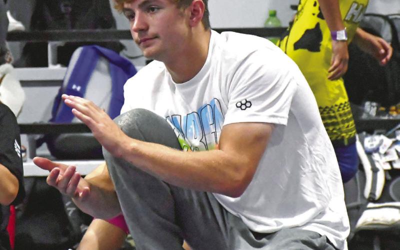 Webster Area wrestler Haeden Jorgenson coaches and cheers on his team during the duals that took place at the Top of the Podium Bassett camp. The camp took place at Sniper Wrestling Academy in Bristol July 18-20 where over 175 wrestlers from across 26 states attended the camp to sharpen their grappling skills. Reporter &amp; Farmer | Annie Witt