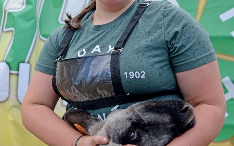 Adaline Larson took reserve grand champion in market sheep Aug. 9 at the Day County Fair. She was also the lone junior showman, receiving grand champion in that category as well. Reporter &amp;amp; Farmer | Annie Witt