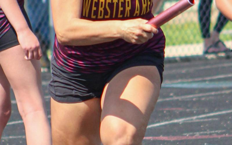 Gracie Cadwell bursts forward at the start of a relay race during the Webster Invitational track meet May 16 held in Webster. Reporter &amp;amp; Farmer | Subscriber snapshot