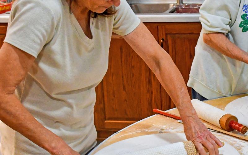 Terry Hagen rolls out lefse dough Nov. 21 during lefse fundraiser at Tabor Church, Webster. The dough must be thin enough so it can evenly cook on both sides, but sturdy enough to not fall apart. Reporter &amp;amp; Farmer | Connor Handrahan