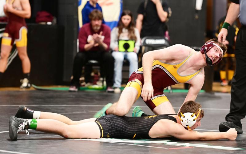 Webster Area Bearcats wrestling season started Dec. 7 with the CWL Booster Club wrestling tournament at Clark High School. Here, Webster Area wrestler Trace Shoemaker lays his knee on the back of his opponent. Reporter &amp;amp; Farmer | Subscriber Snapshot