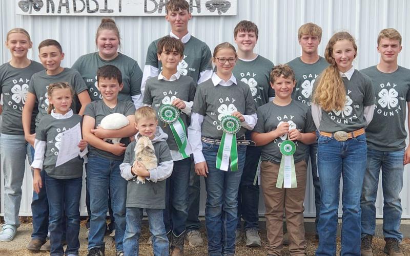 Participating in the Day County Fair 4-H rabbit show are in front Sawyer Zenk; from left, middle, Ava Schulz, Logan Wik, James Schulz, overall grand champion Raelee Ellingson, Abel Bloom, Carlee Wik; back, Brooke Grajczyk, Shawn Grajczyk, overall reserve champion Kelsey Fischer, Gage Wik, Carson Fischer, Michael Dorsett and Martin Dorsett. Reporter &amp;amp; Farmer | Subscriber snapshot