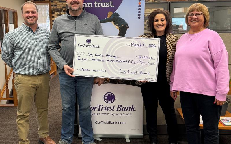 Day County Housing was awarded an $8,750 grant from CorTrust Bank, in partnership with Federal Home Loan Bank of Des Moines (FHLB Des Moines) as part of their matching grant program called the Member Impact Fund. Pictured March 31 at CorTrust Bank in Webster are, from left, Day County Housing board members Morgan Dorsett, Derek Sinner; Webster CorTrust Bank manager Lana Holland and Day County Housing board member Peggy Ninke. Reporter &amp;amp; Farmer | Subscriber snapshot