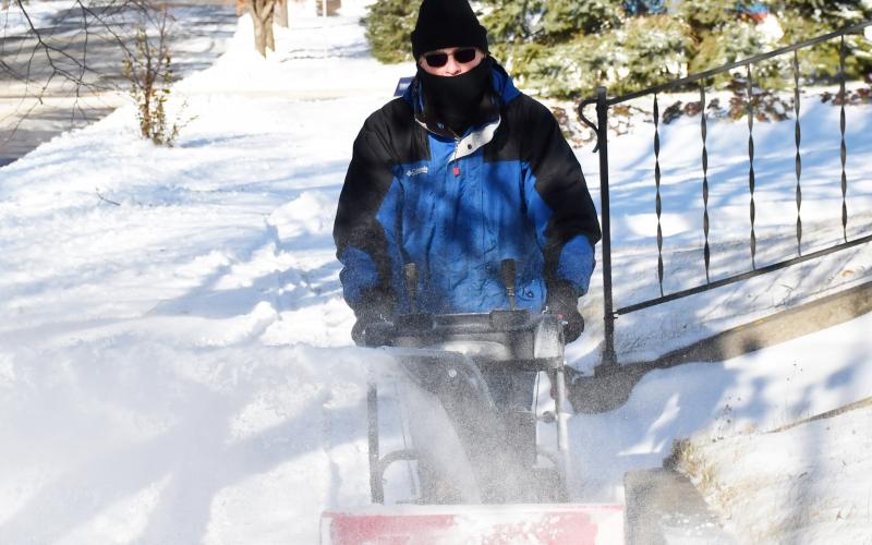 Day County received the first snow fall of winter late Nov. 19 with blistering winds and gusts of snow. Here, Sam Janssen uses a snow blower to clear his sidewalk of the fresh snow on E. 9th Ave., Webster Nov. 21. Reporter &amp;amp; Farmer | Brenner Cariveau